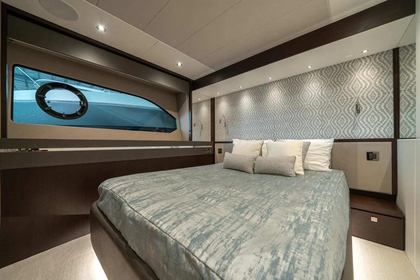 a bed with a blue screen aboard 76 YACHT Yacht for Sale