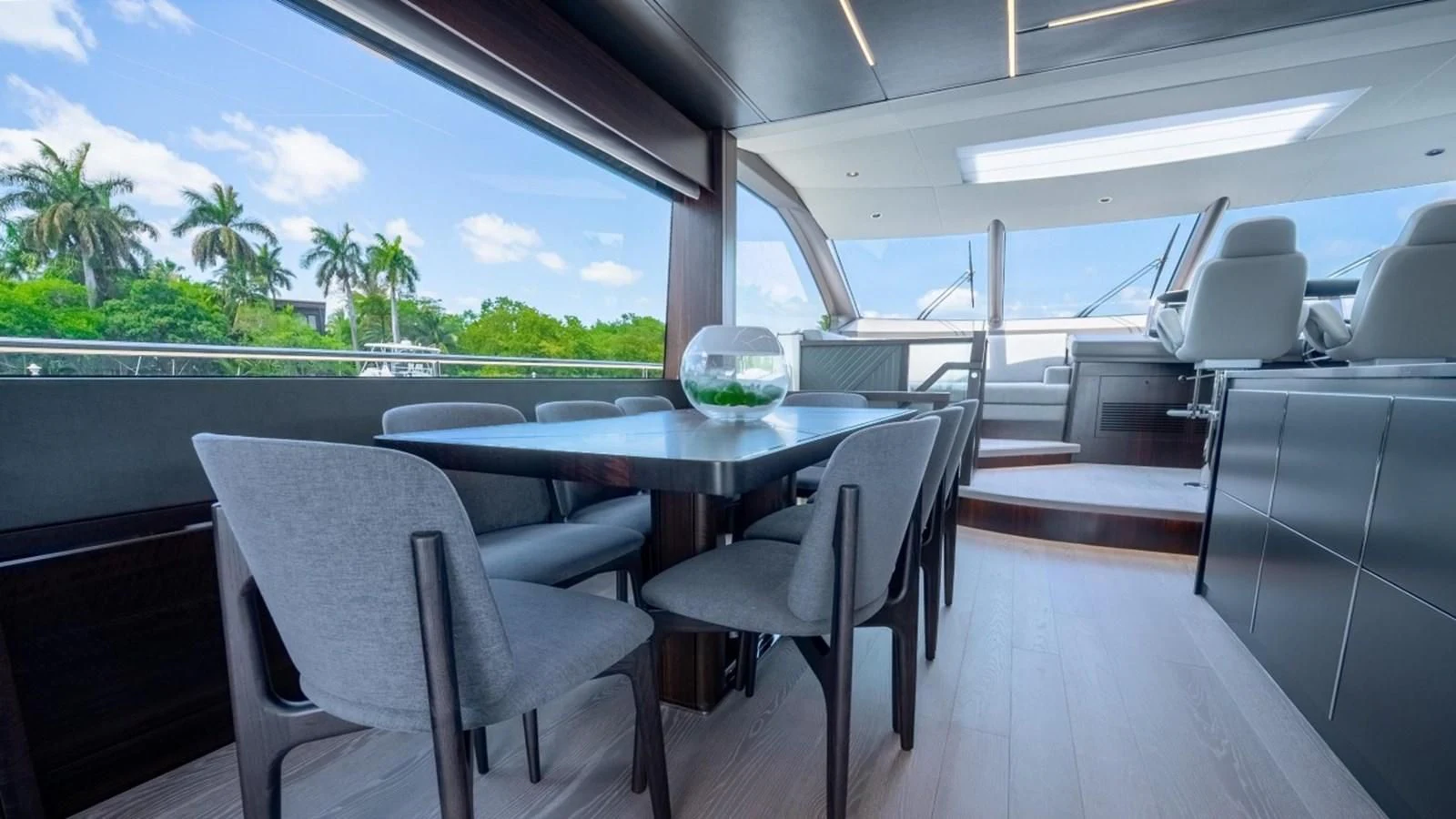 a table and chairs on a boat aboard 76 YACHT Yacht for Sale