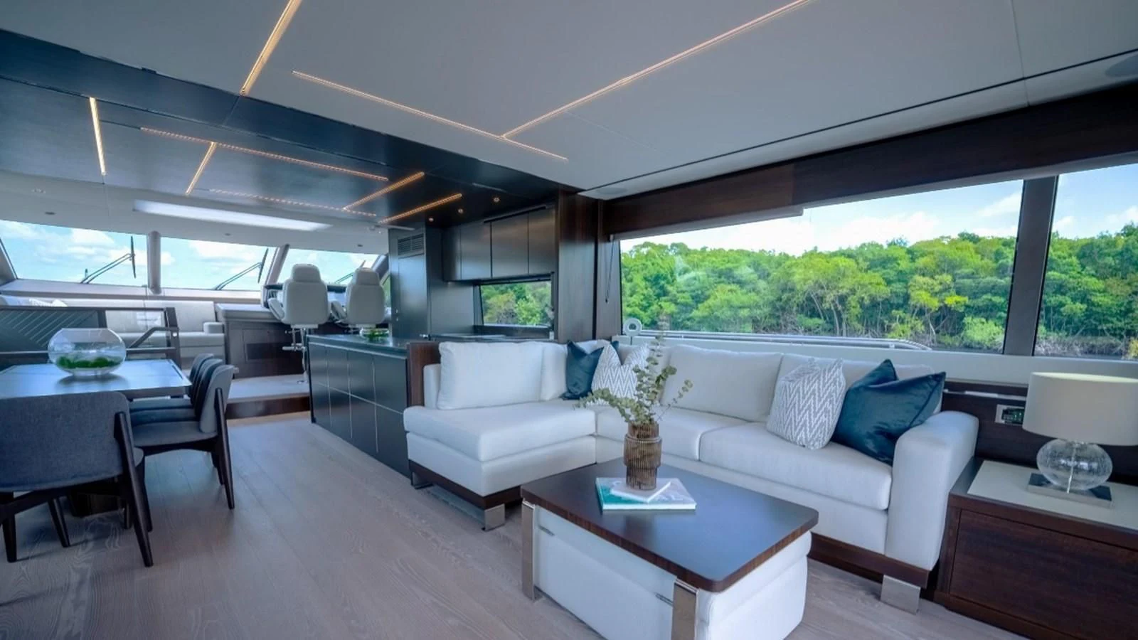 a living room with a couch and a table aboard 76 YACHT Yacht for Sale