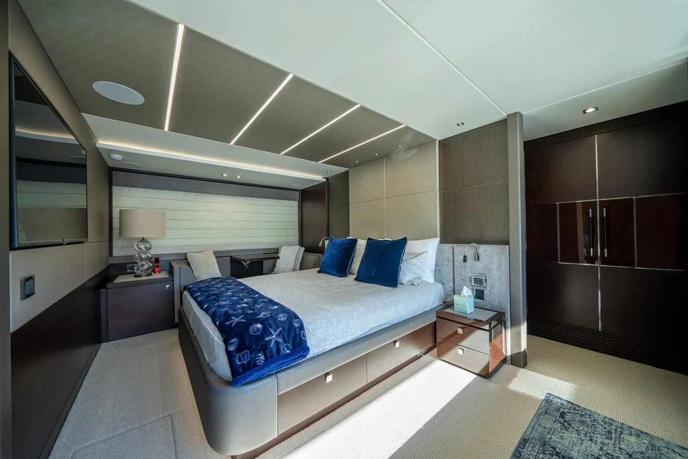 a modern bedroom with a bed aboard 76 YACHT Yacht for Sale