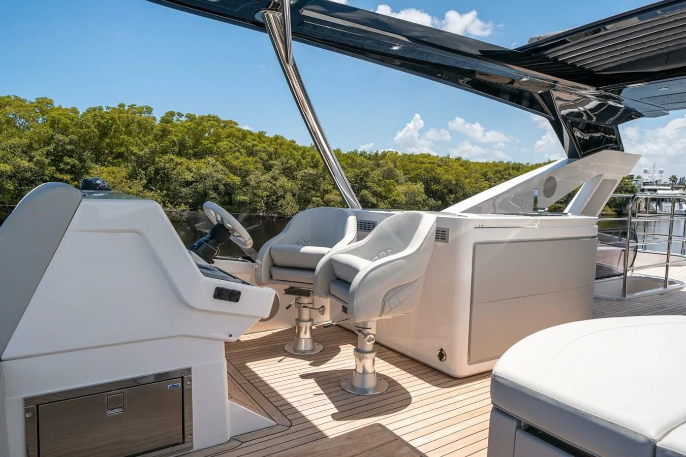 a white car on a wooden deck aboard 76 YACHT Yacht for Sale