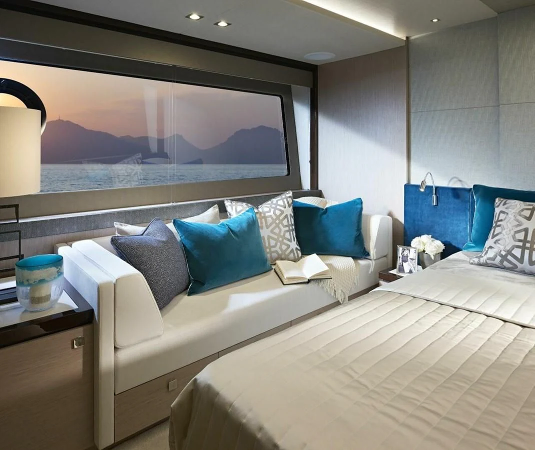 a room with a bed and a television aboard 76 YACHT Yacht for Sale