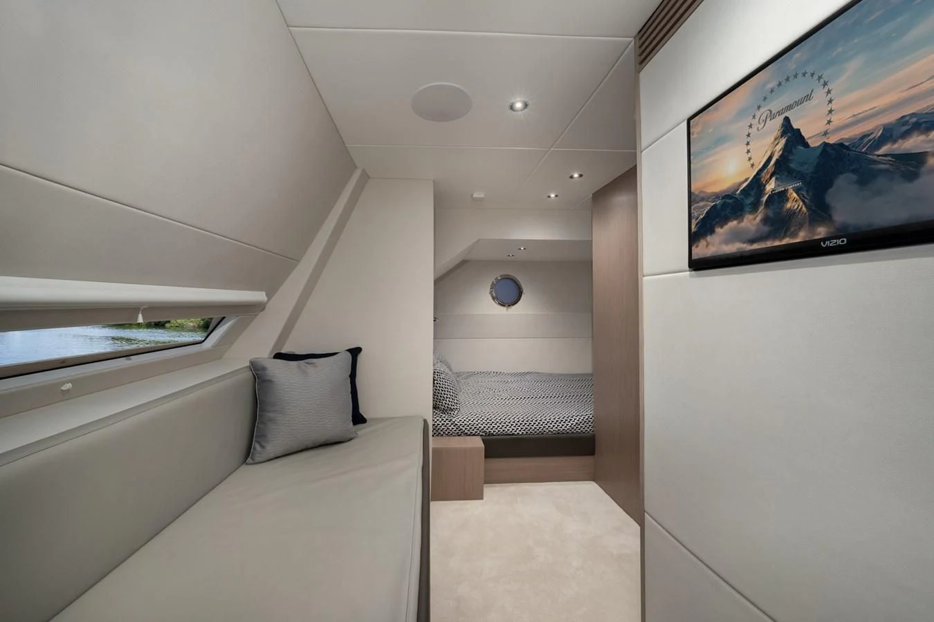 a white couch in a room aboard 76 YACHT Yacht for Sale