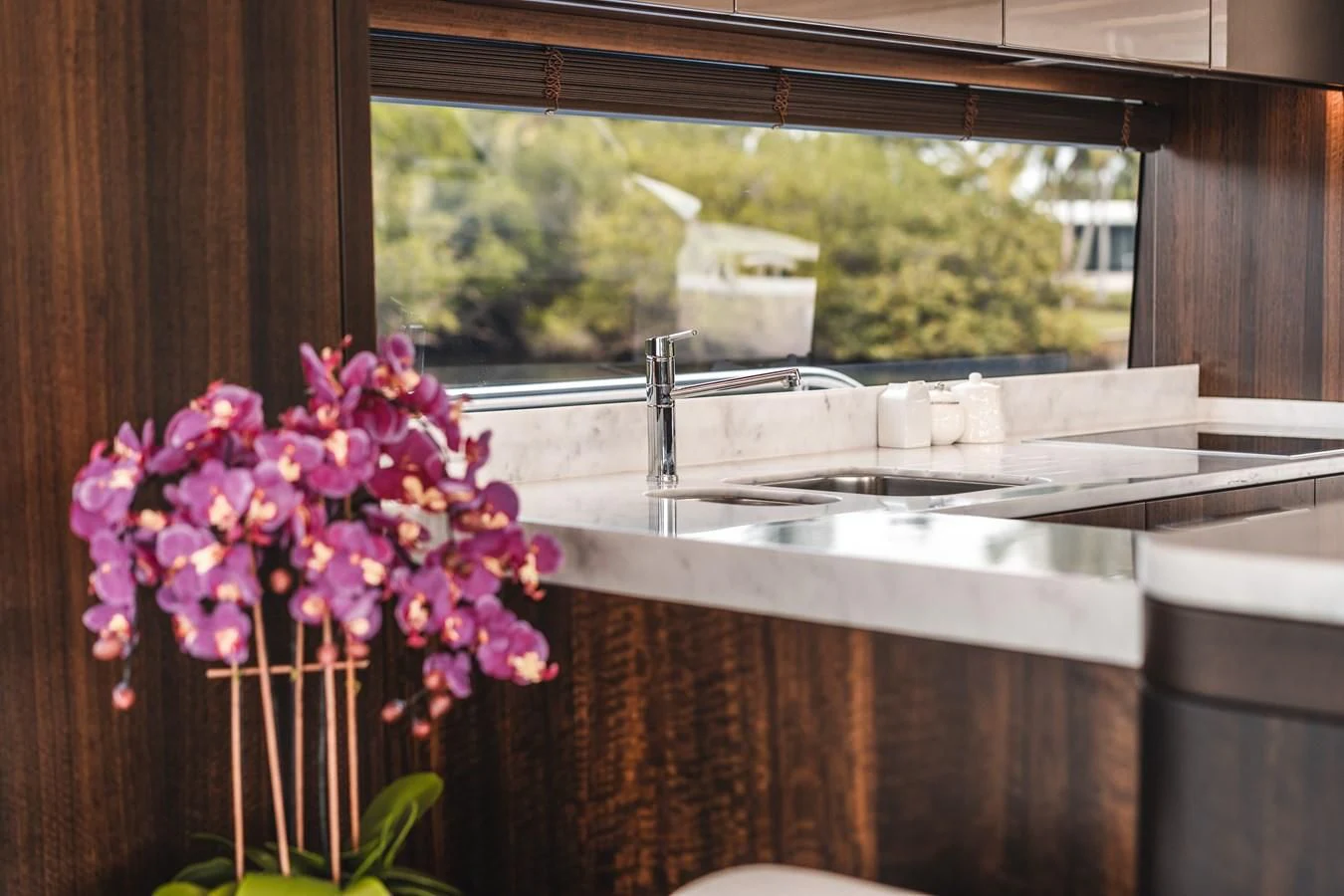 a kitchen sink with purple flowers aboard 76 YACHT Yacht for Sale