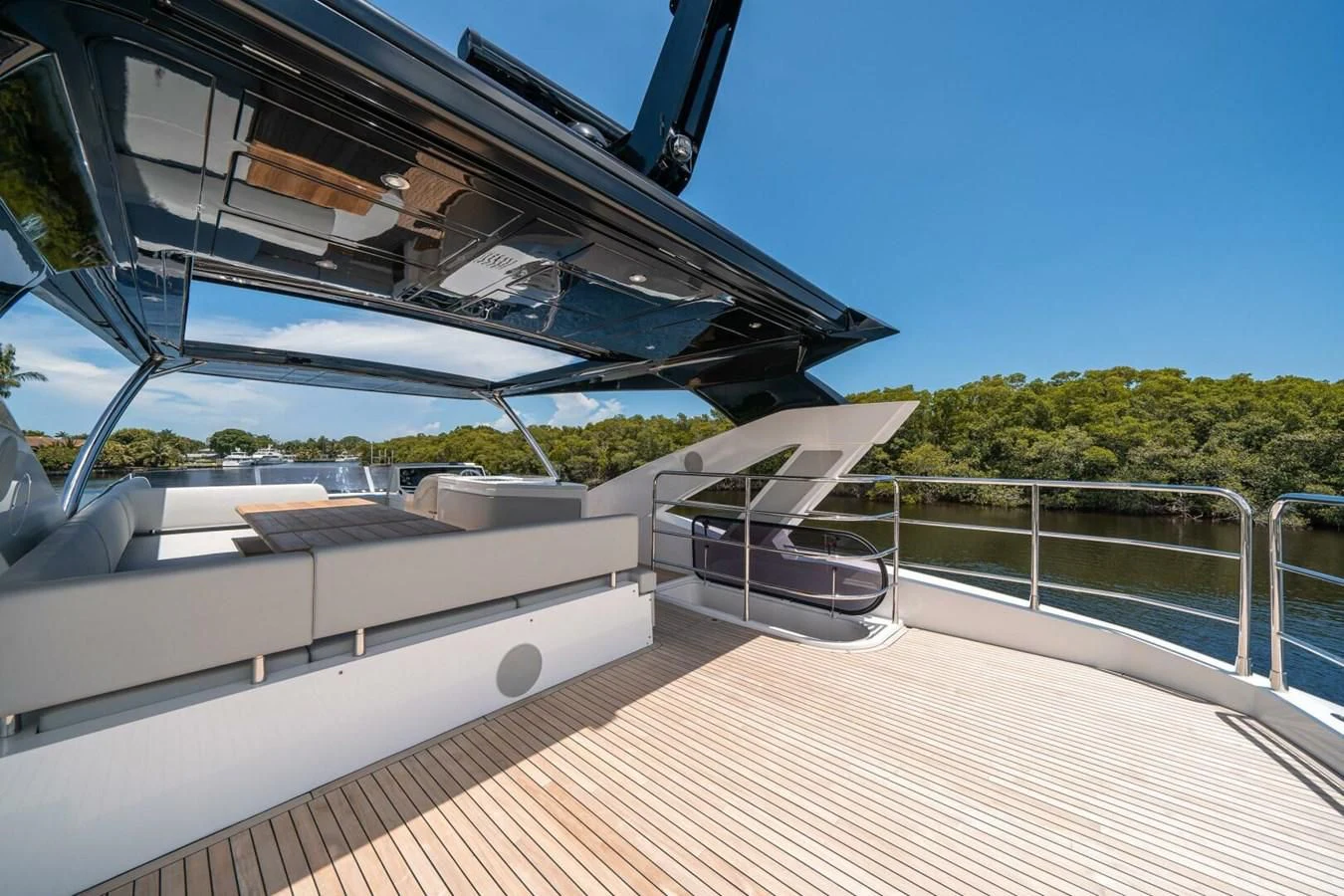 a large white building with a curved roof and a pool aboard 76 YACHT Yacht for Sale