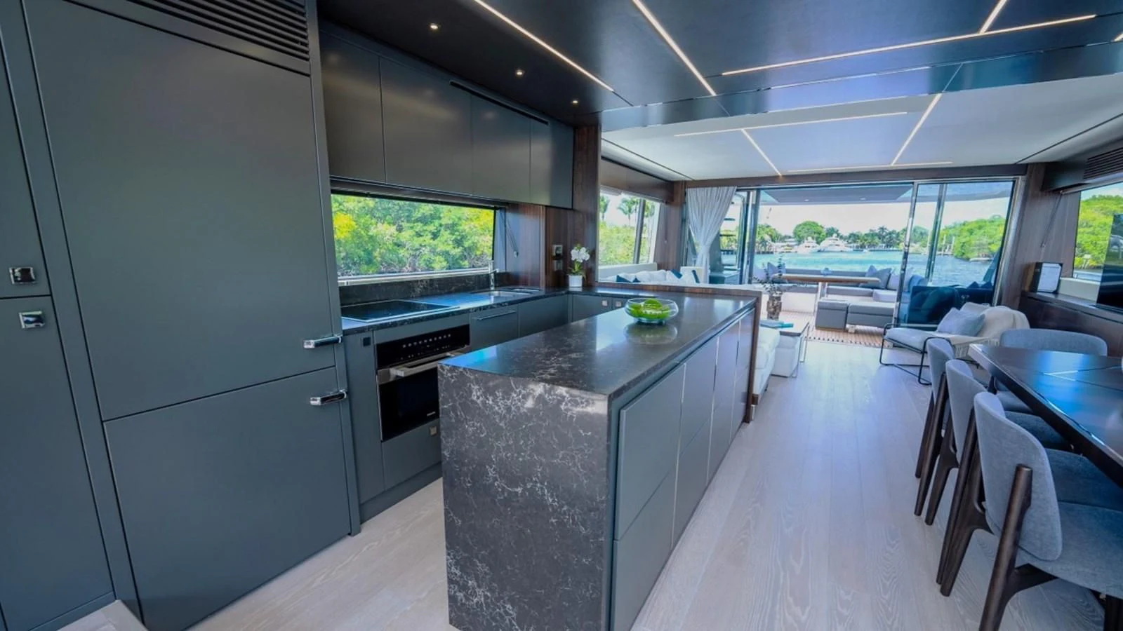 a kitchen with a large island aboard 76 YACHT Yacht for Sale