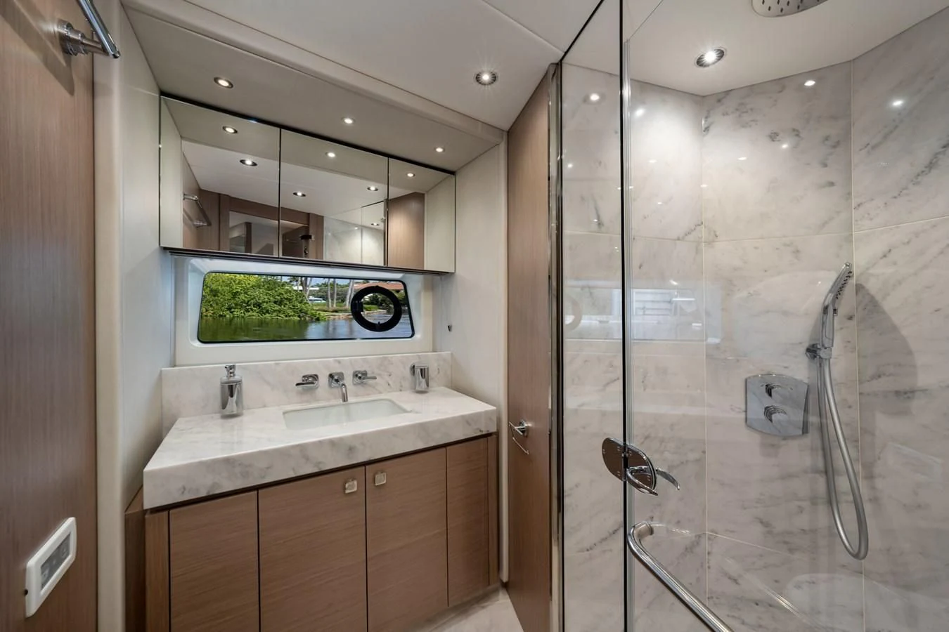 a bathroom with a glass shower aboard 76 YACHT Yacht for Sale