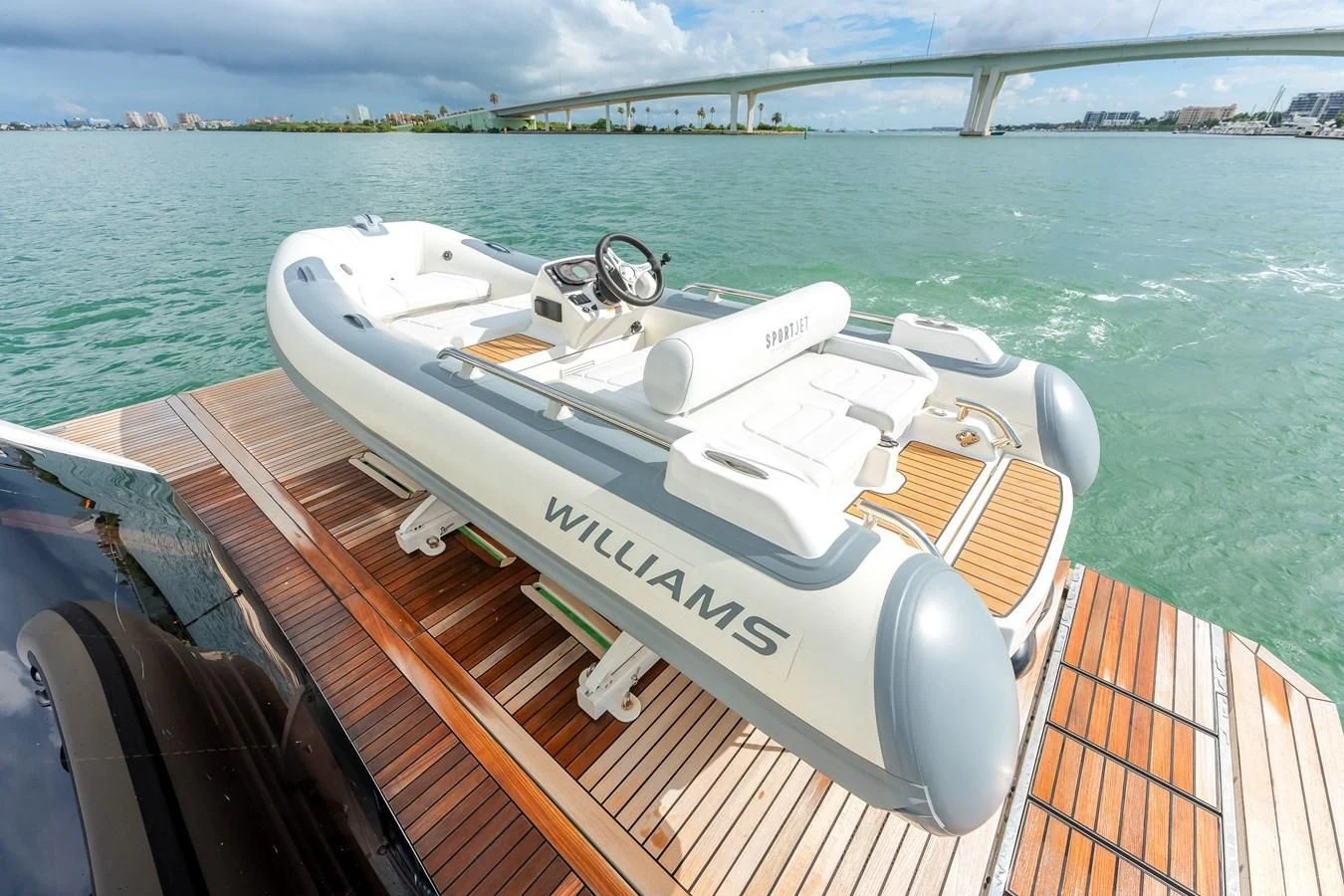 a speed boat on the water aboard 76 YACHT Yacht for Sale