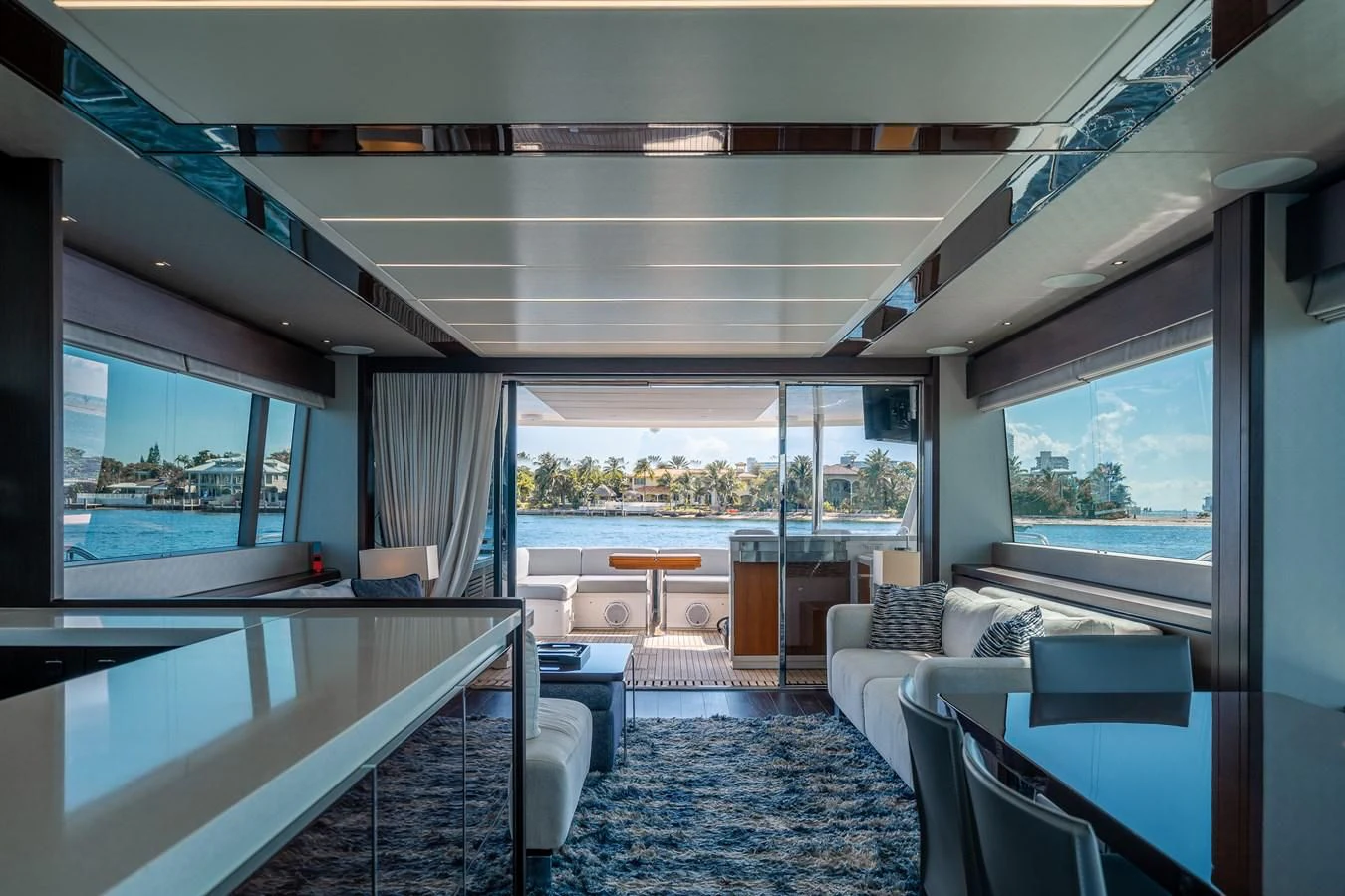 a room with a large window and a view of the city aboard 76 YACHT Yacht for Sale