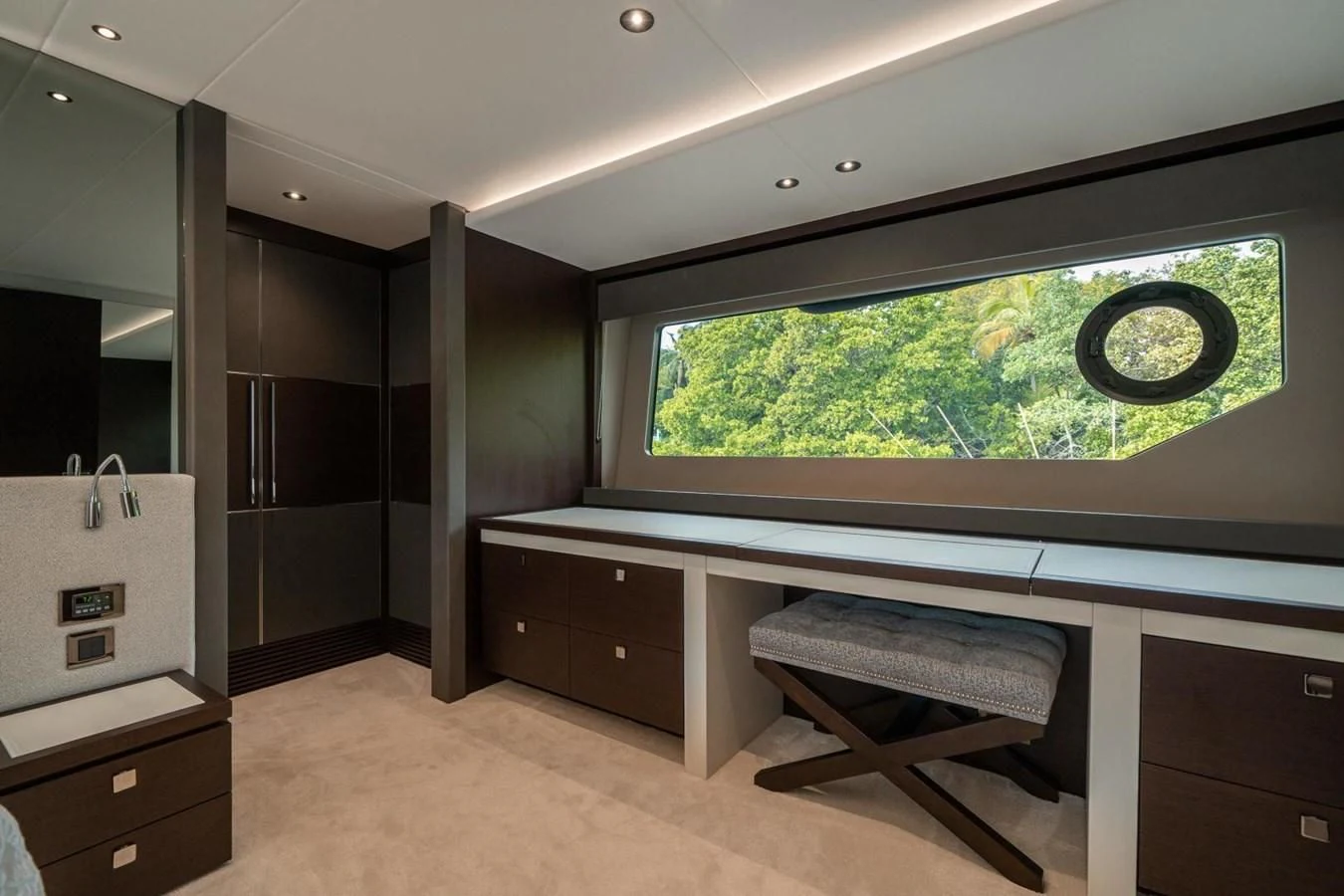 a room with a large window and a bench aboard 76 YACHT Yacht for Sale