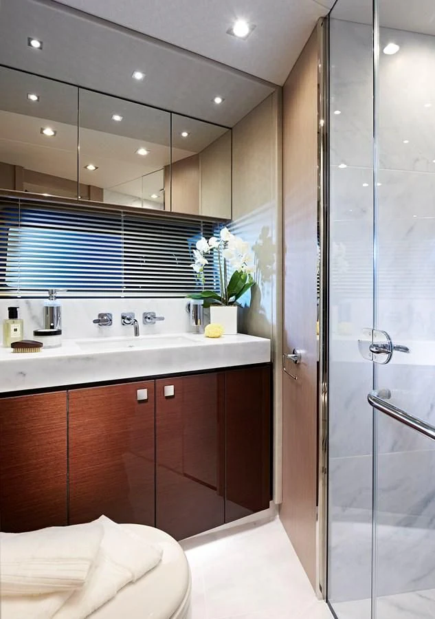 a bathroom with a glass shower aboard 76 YACHT Yacht for Sale