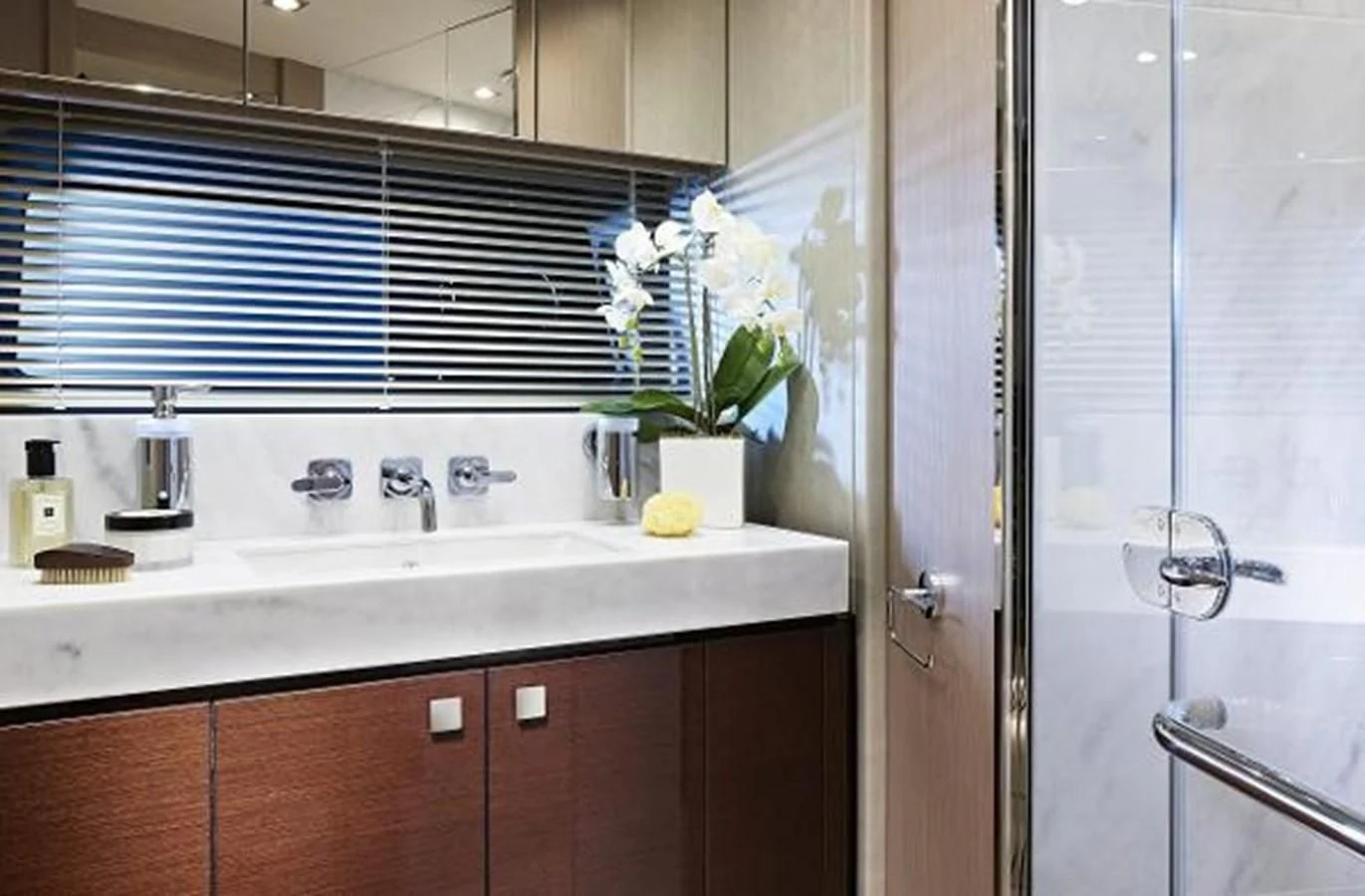 a kitchen with a sink and cabinets aboard 76 YACHT Yacht for Sale