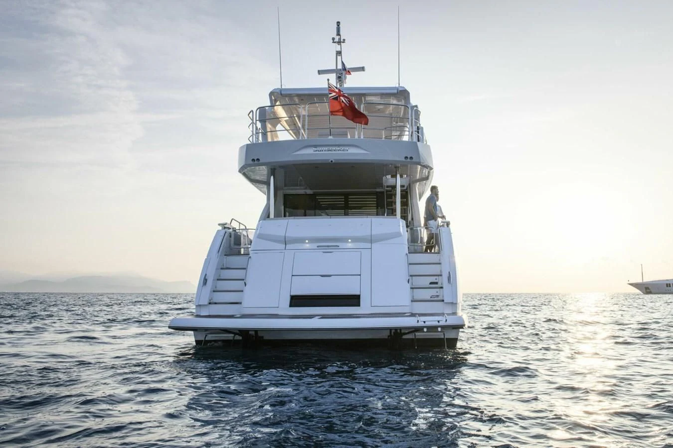 a white boat in the water aboard 76 YACHT Yacht for Sale