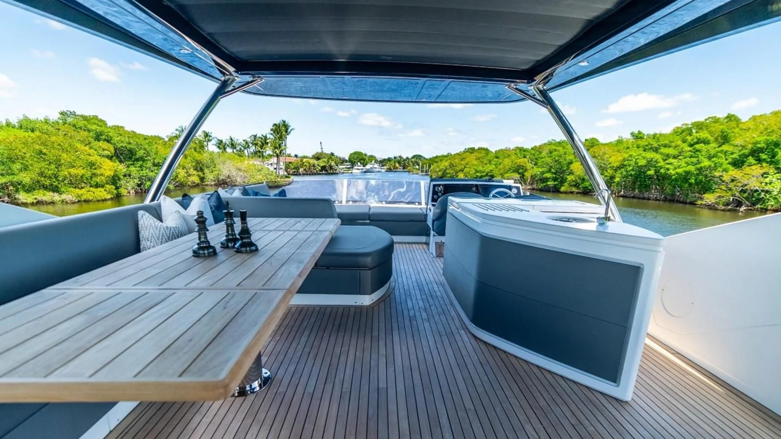 a deck with a computer and a television on it aboard 76 YACHT Yacht for Sale