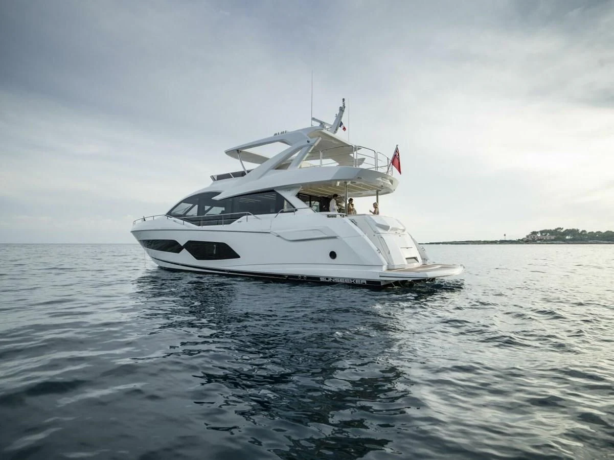 a white boat in the water aboard 76 YACHT Yacht for Sale