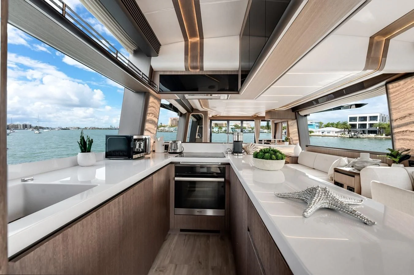 a kitchen with a large window aboard 76 YACHT Yacht for Sale