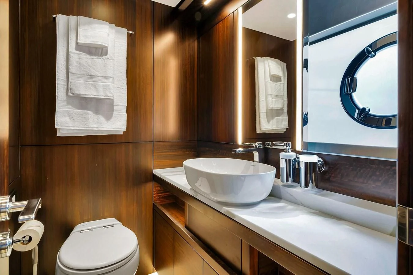 a bathroom with a sink and a toilet aboard 76 YACHT Yacht for Sale