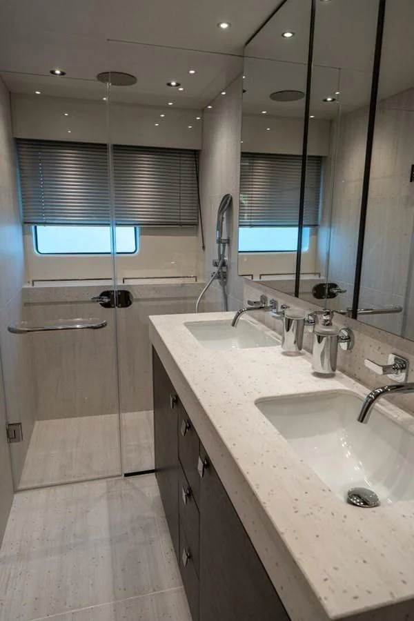 a bathroom with a large mirror aboard 76 YACHT Yacht for Sale