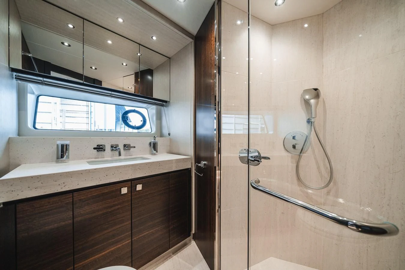 a bathroom with a shower unit and sink aboard 76 YACHT Yacht for Sale