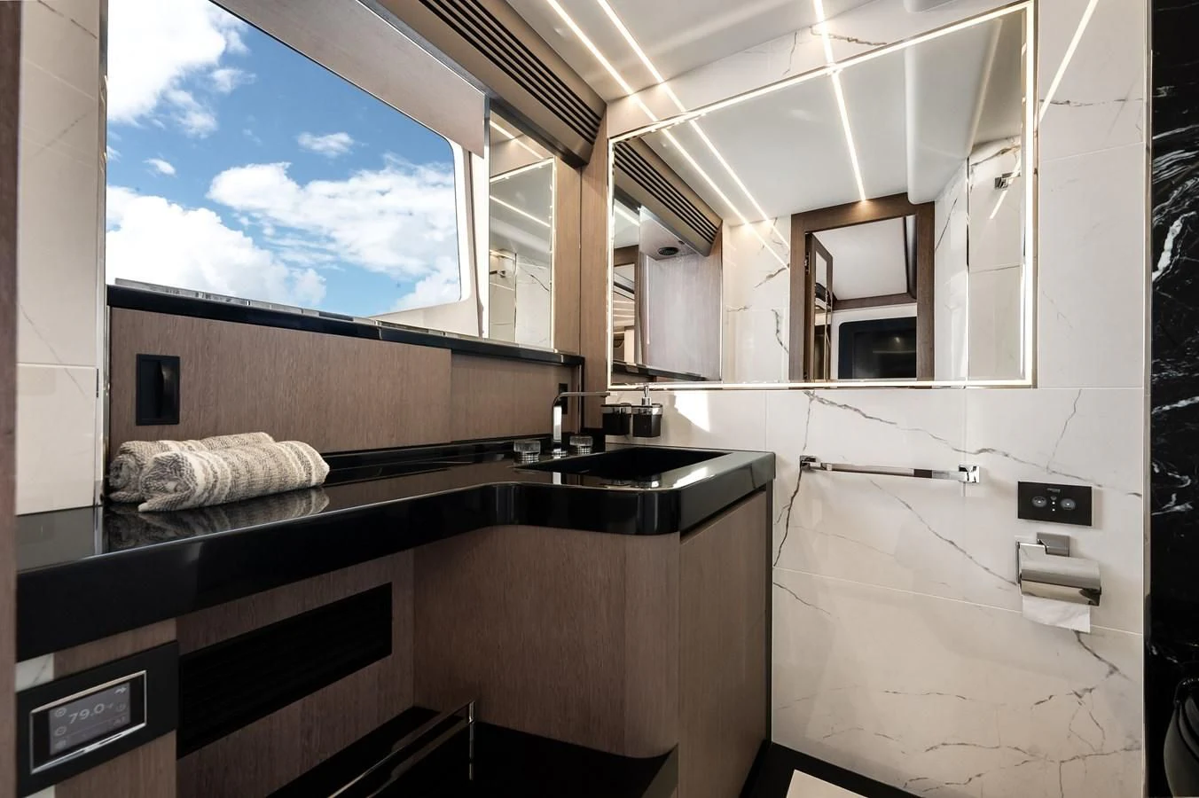 a bathroom with a large window aboard 76 YACHT Yacht for Sale