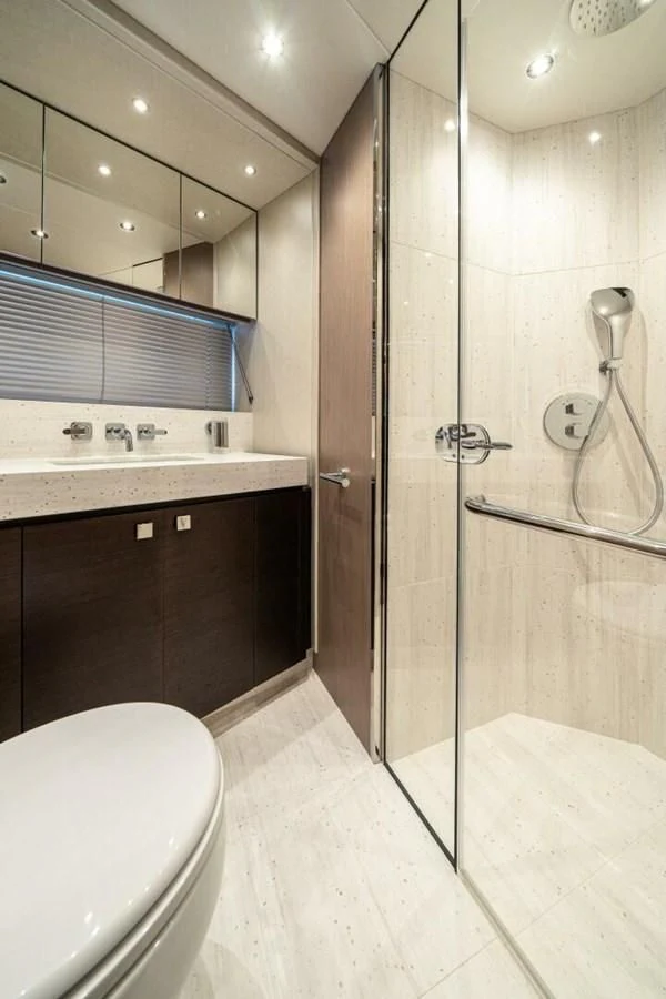 a bathroom with a glass shower aboard 76 YACHT Yacht for Sale