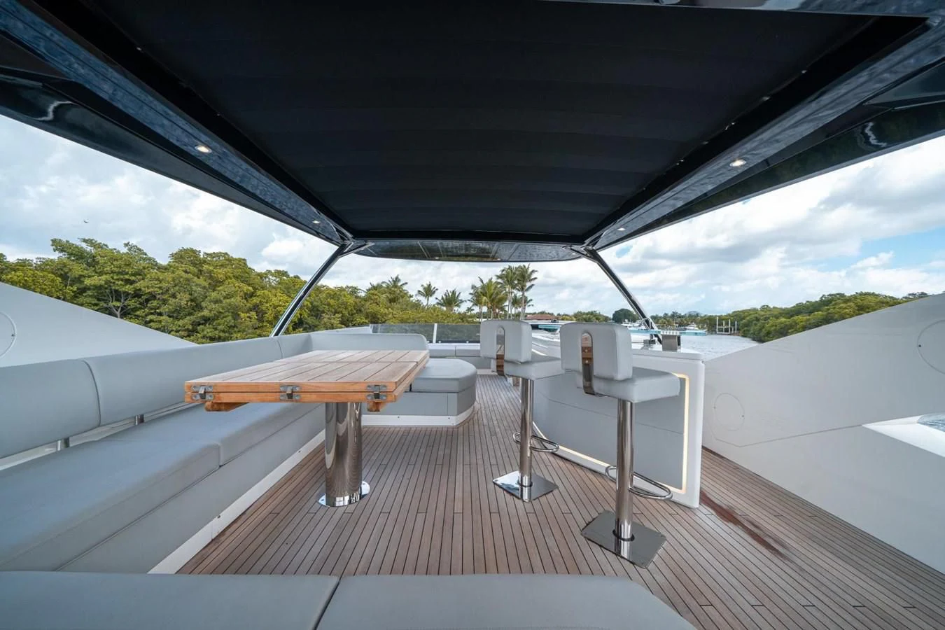 a wooden table on a deck aboard 76 YACHT Yacht for Sale