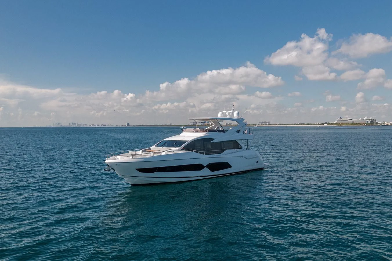 a white boat in the water aboard 76 YACHT Yacht for Sale