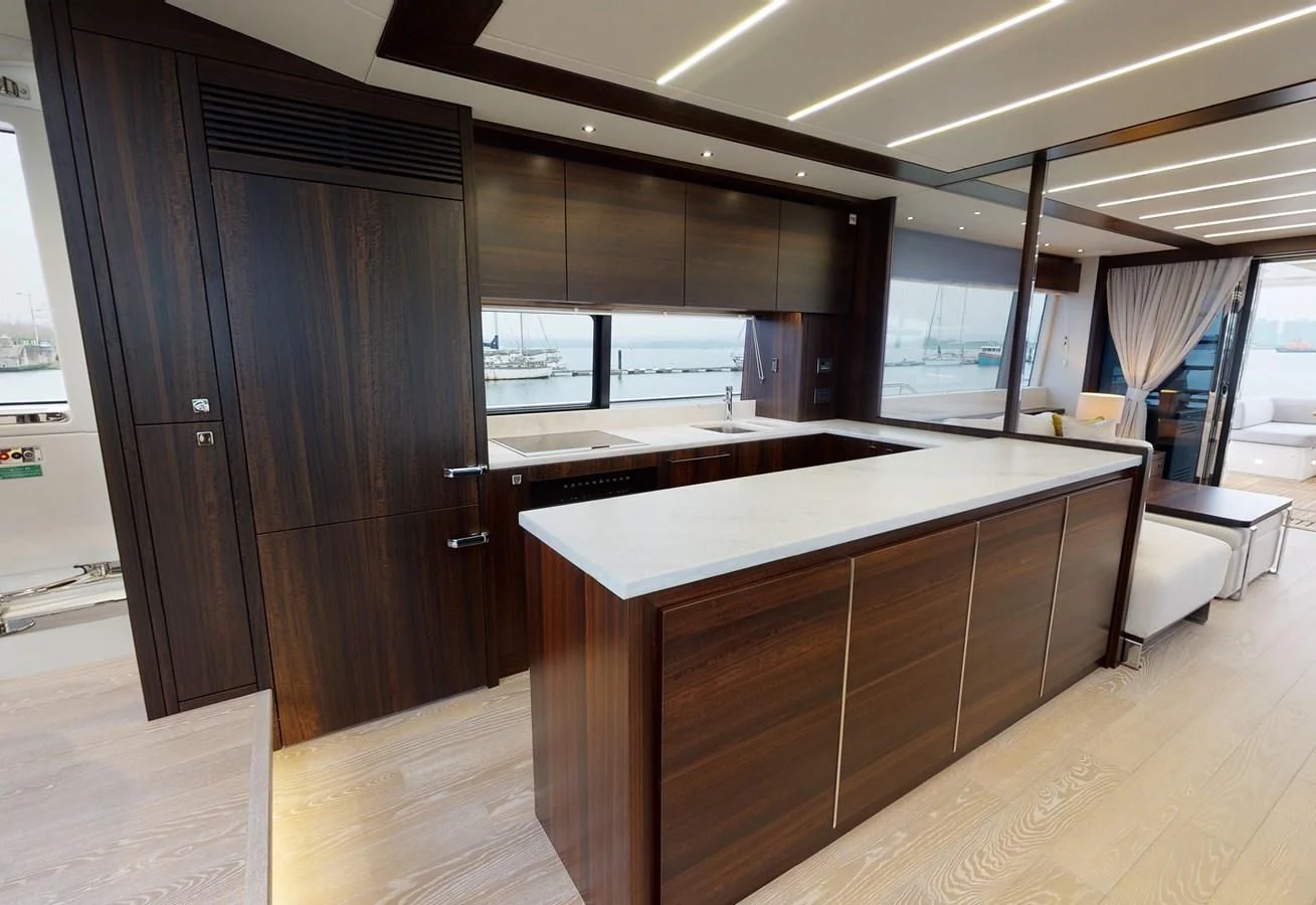 a room with a large table and chairs aboard 76 YACHT Yacht for Sale