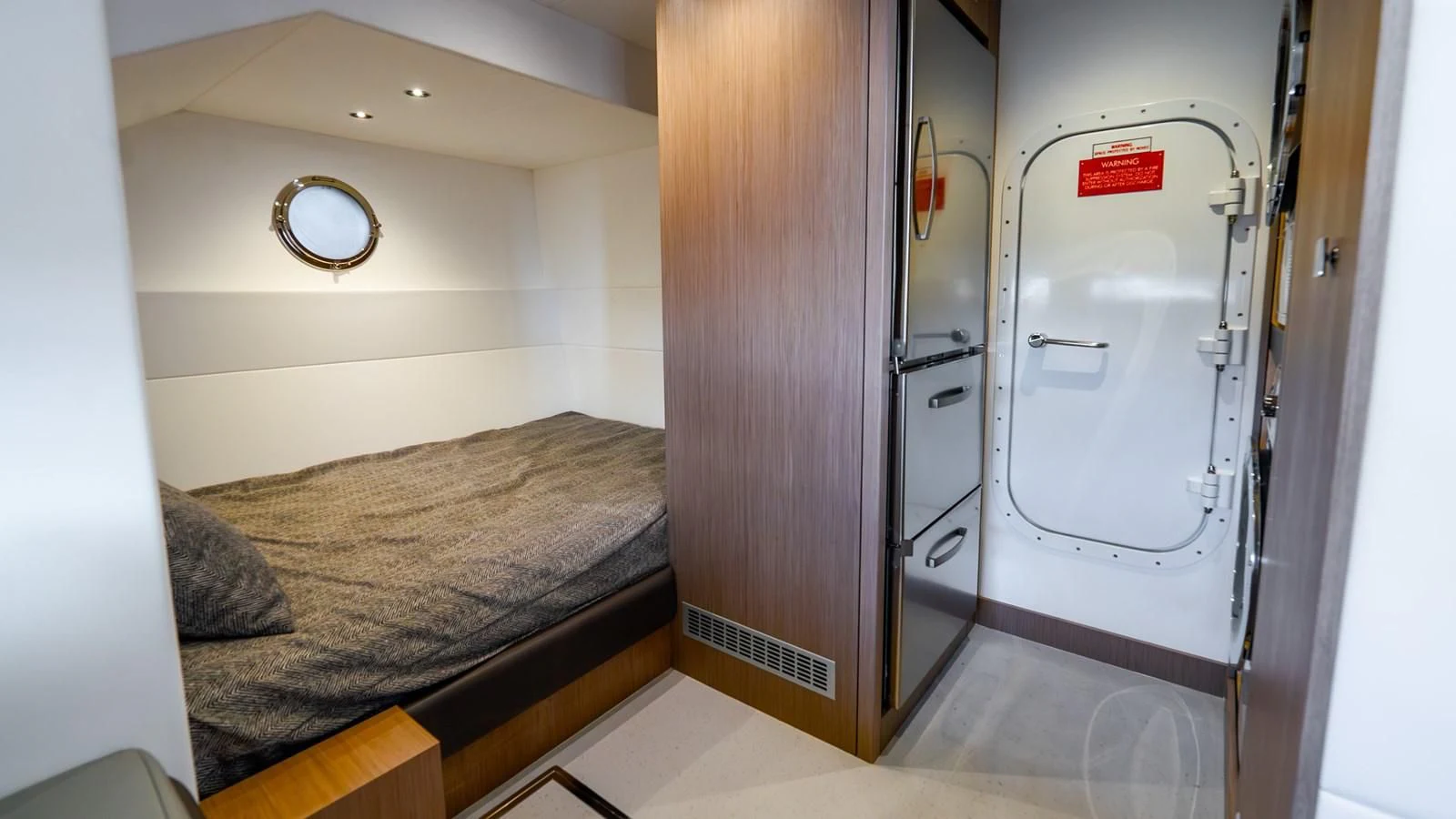 a room with a bed and a closet aboard 76 YACHT Yacht for Sale