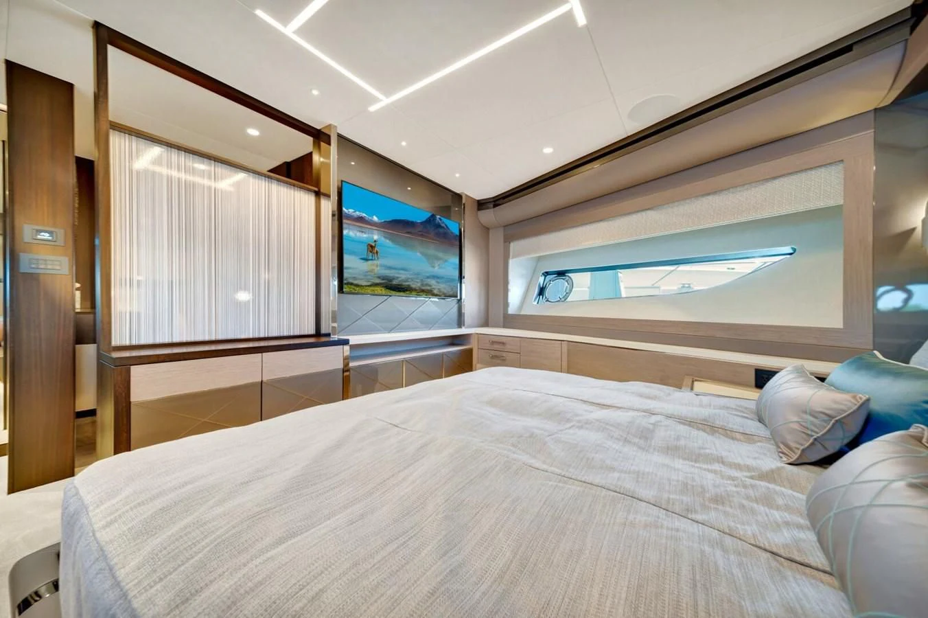 a bed with a large mirror above it aboard 76 YACHT Yacht for Sale