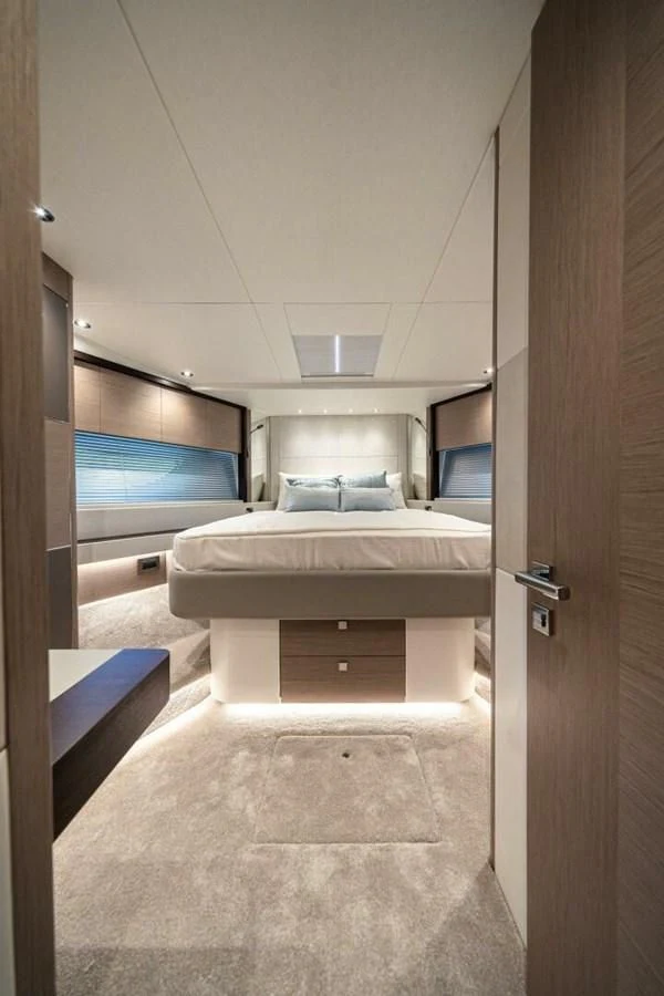 a room with a bed and a television aboard 76 YACHT Yacht for Sale