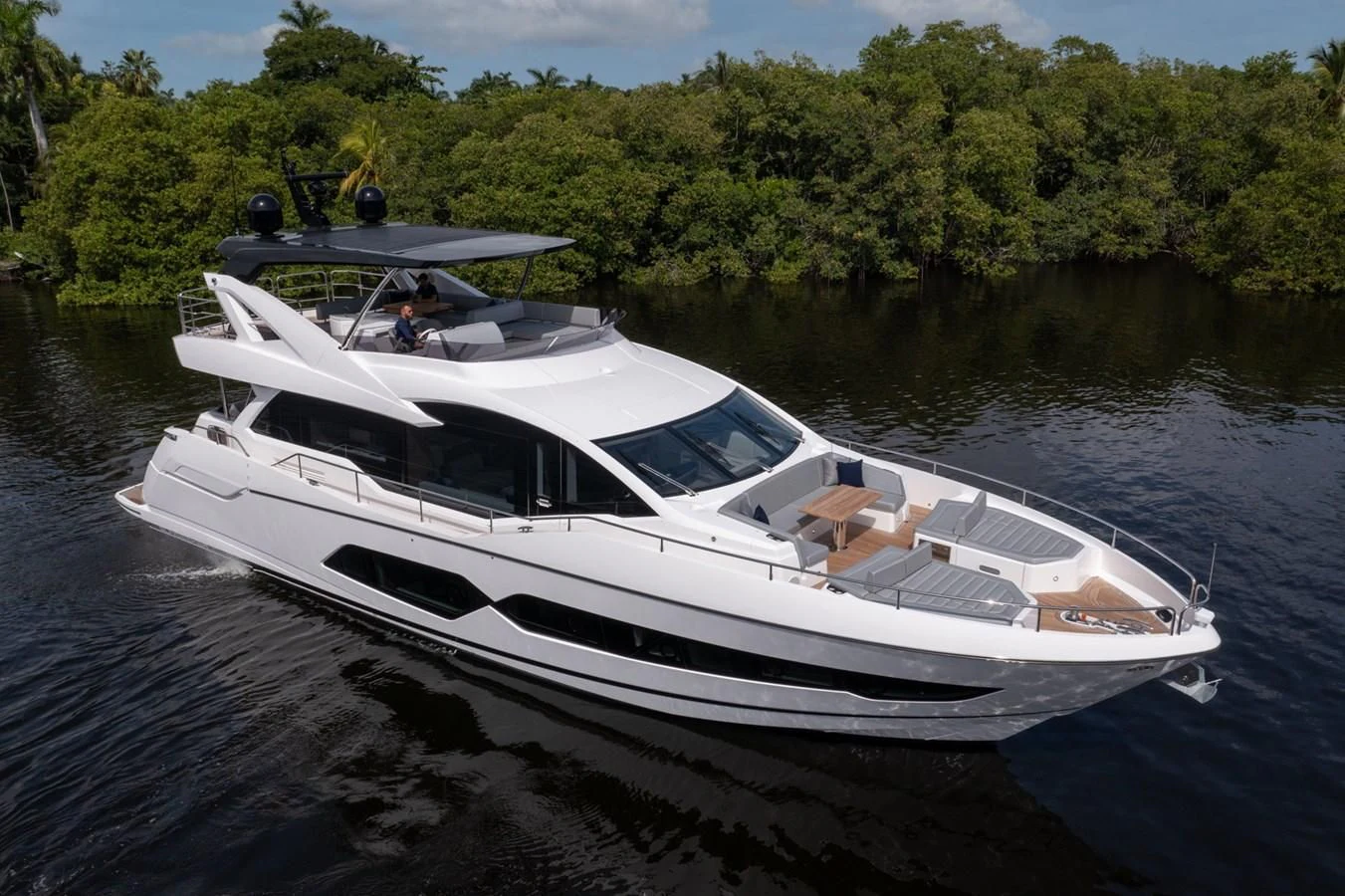 a white boat on water aboard 76 YACHT Yacht for Sale