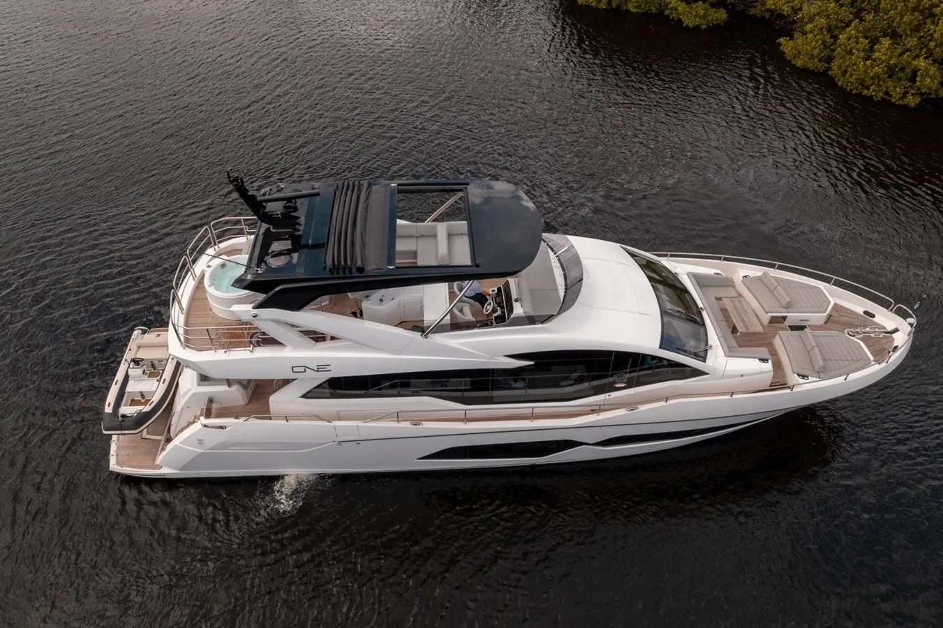 a white sports car on a road aboard 76 YACHT Yacht for Sale