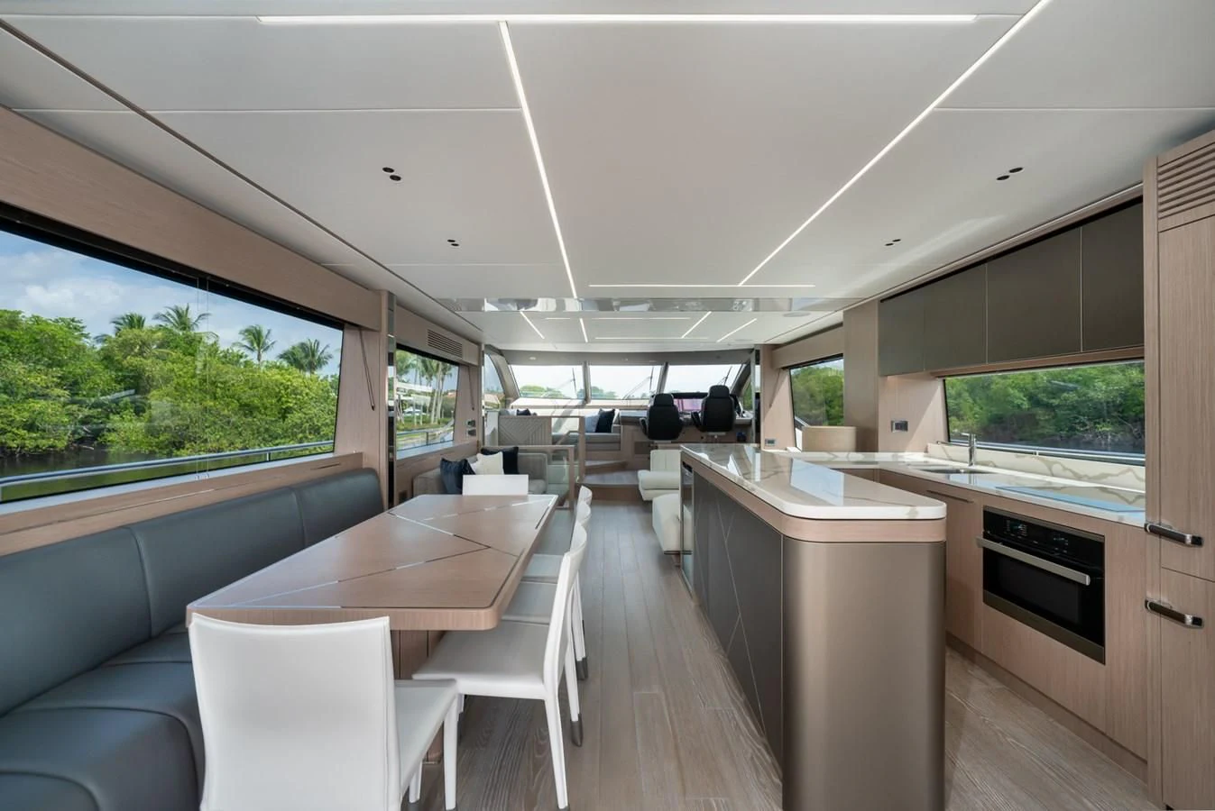 a room with a table chairs and a window aboard 76 YACHT Yacht for Sale