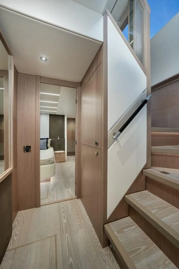 a hallway with a door and a window aboard 76 YACHT Yacht for Sale