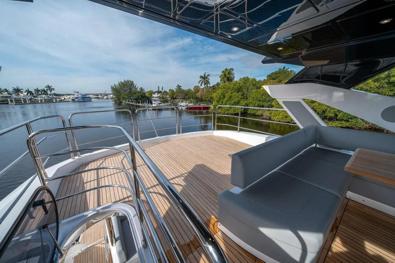 a deck with a view of a city and water aboard 76 YACHT Yacht for Sale