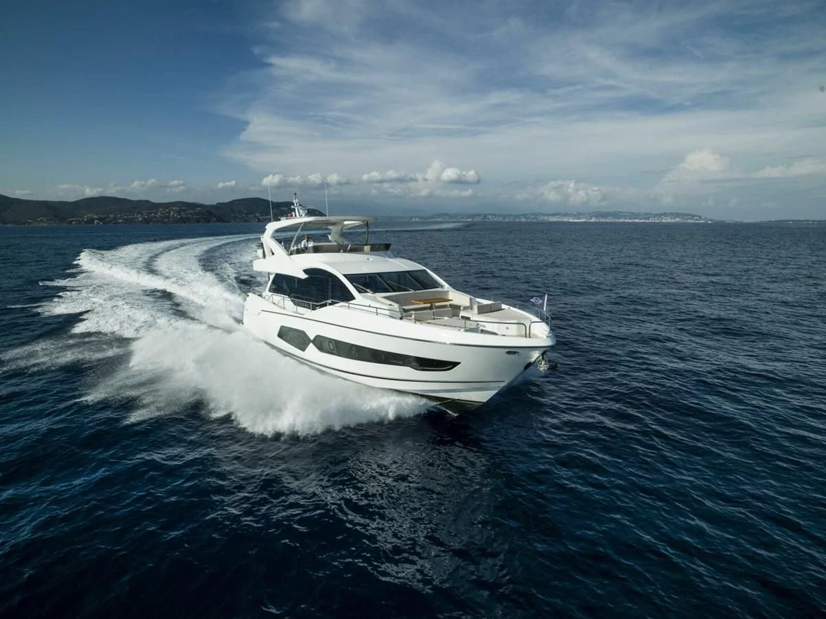 a white boat on water aboard 76 YACHT Yacht for Sale