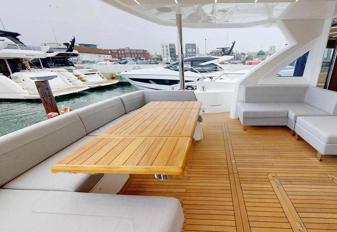 a room with a deck and several boats in it aboard 76 YACHT Yacht for Sale