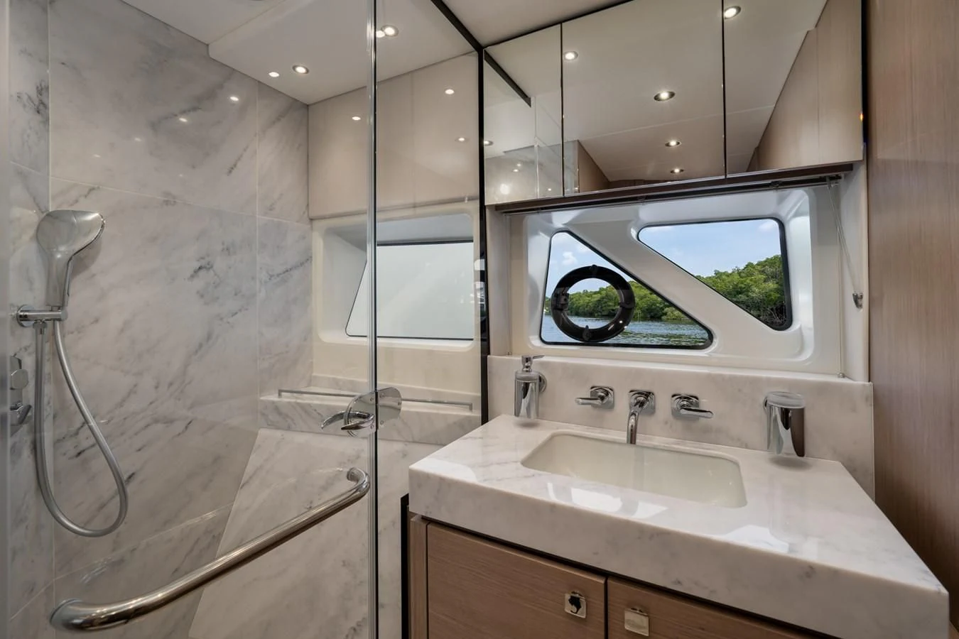 a bathroom with a large mirror aboard 76 YACHT Yacht for Sale