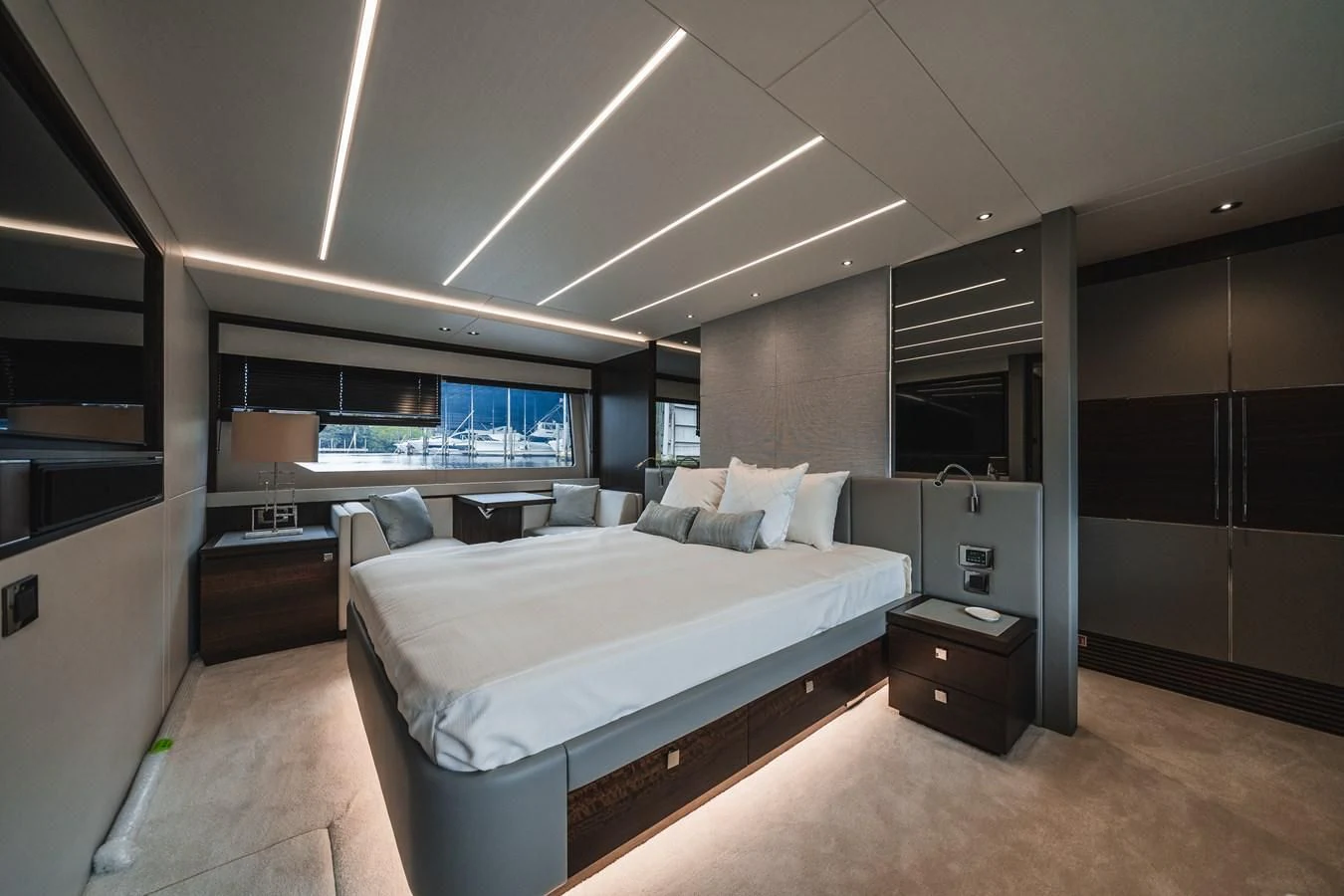 a room with a bed and a window aboard 76 YACHT Yacht for Sale