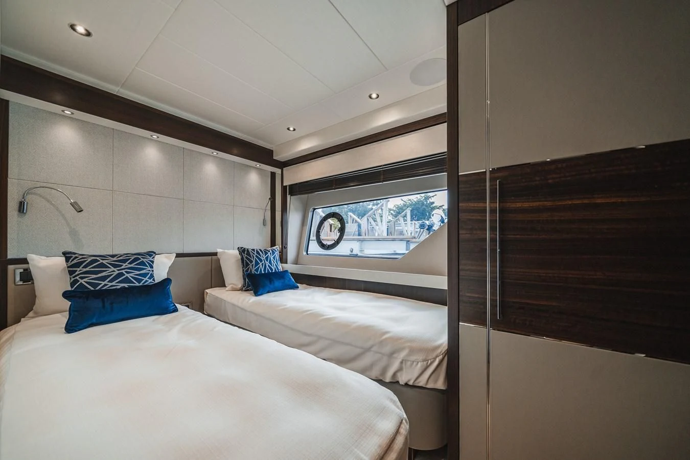 a room with two beds aboard 76 YACHT Yacht for Sale