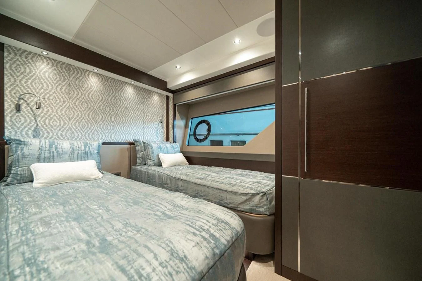 a room with two beds aboard 76 YACHT Yacht for Sale