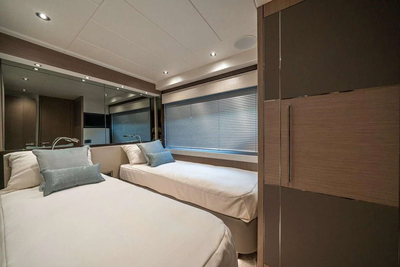 a room with two beds aboard 76 YACHT Yacht for Sale