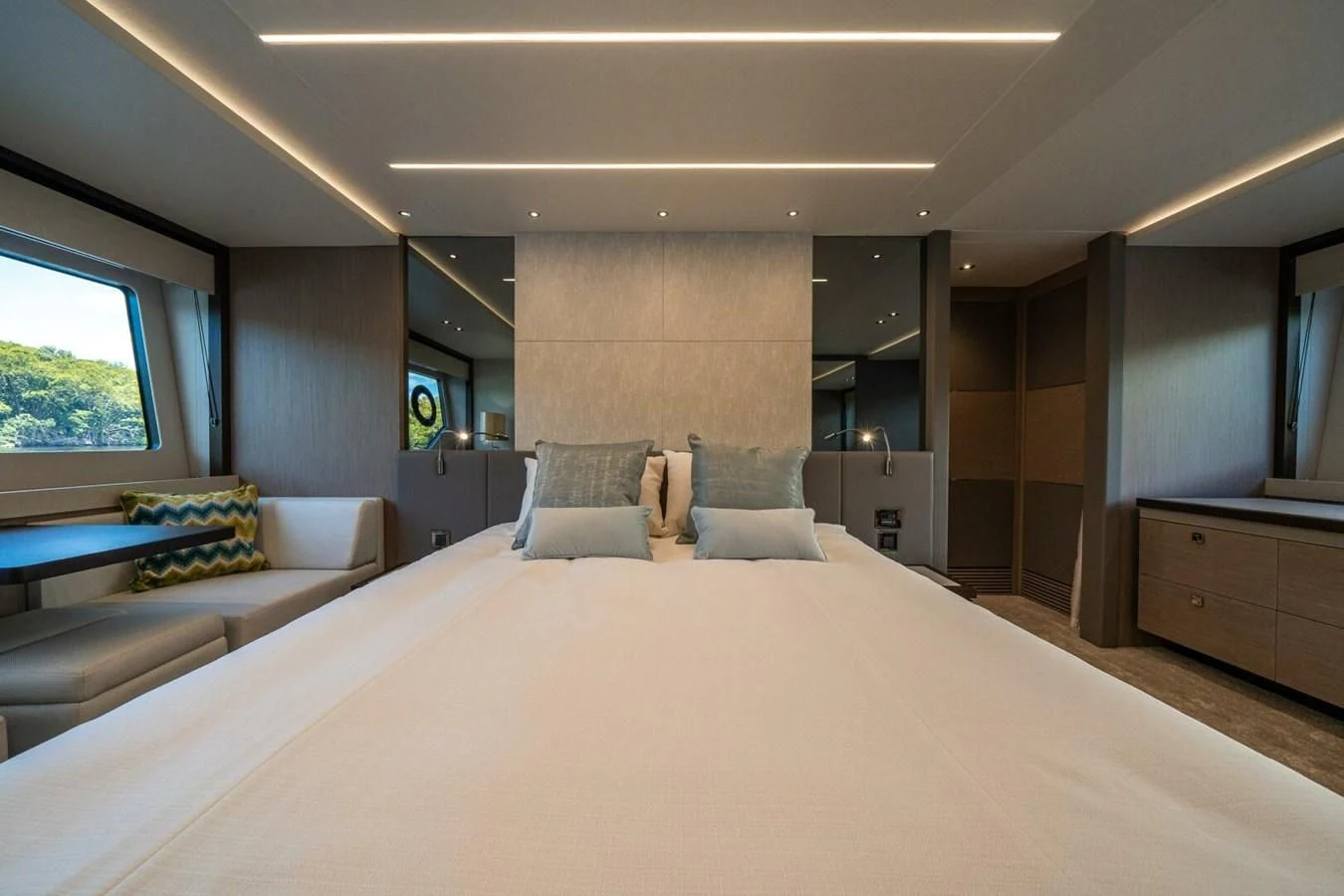 a large bedroom with a bed and a couch aboard 76 YACHT Yacht for Sale