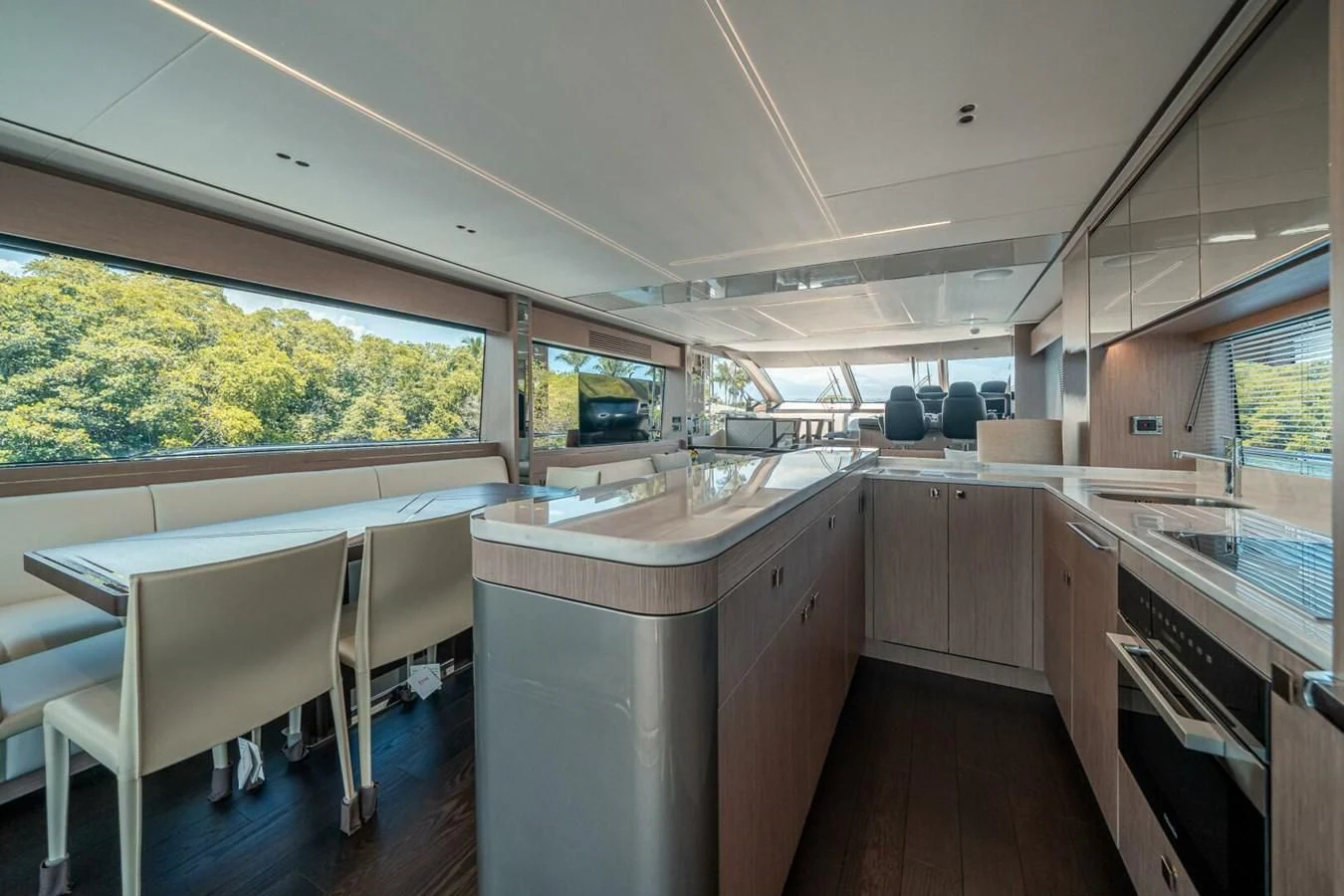 a kitchen with a large island aboard 76 YACHT Yacht for Sale