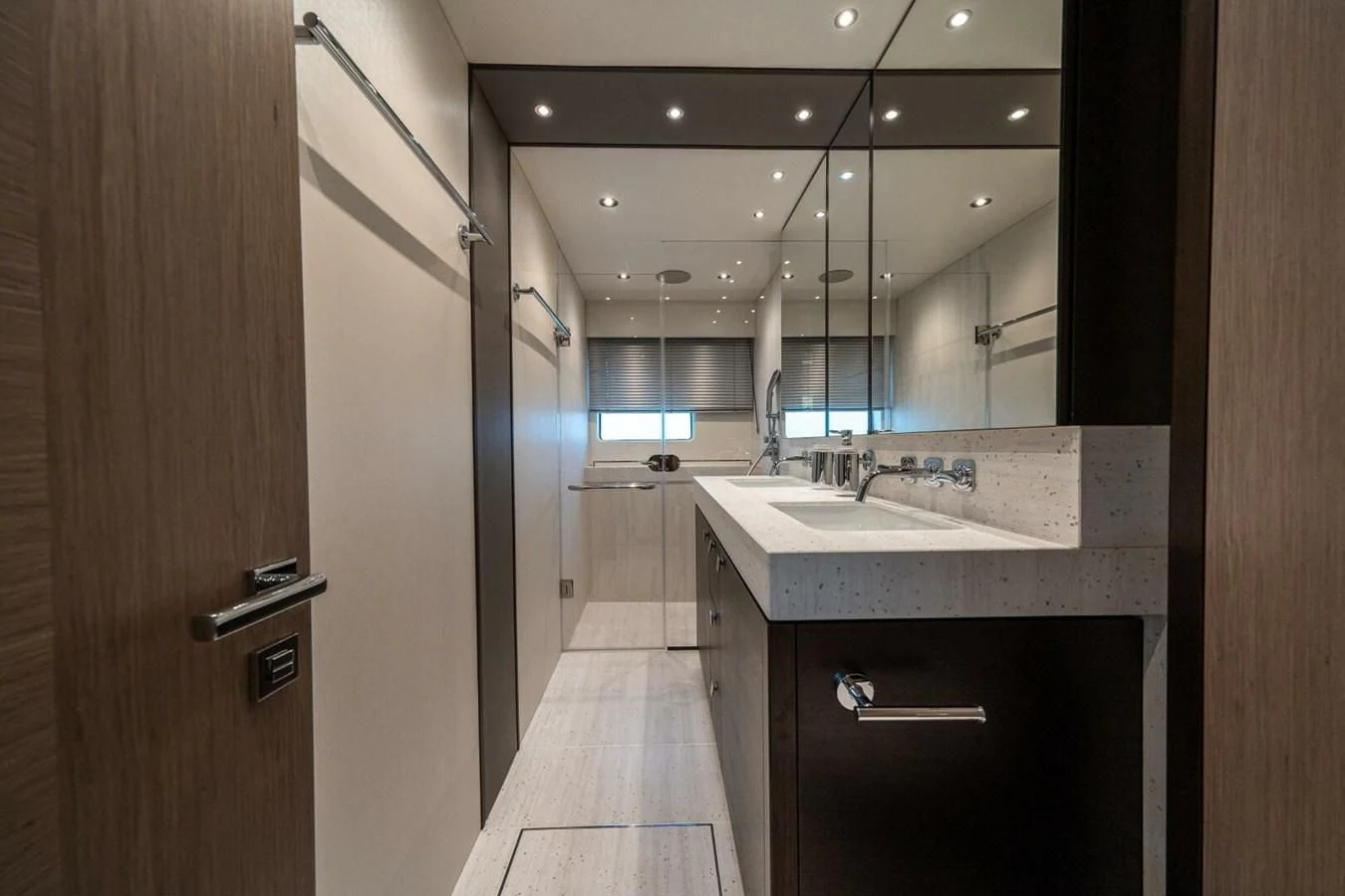 a bathroom with a sink and a mirror aboard 76 YACHT Yacht for Sale