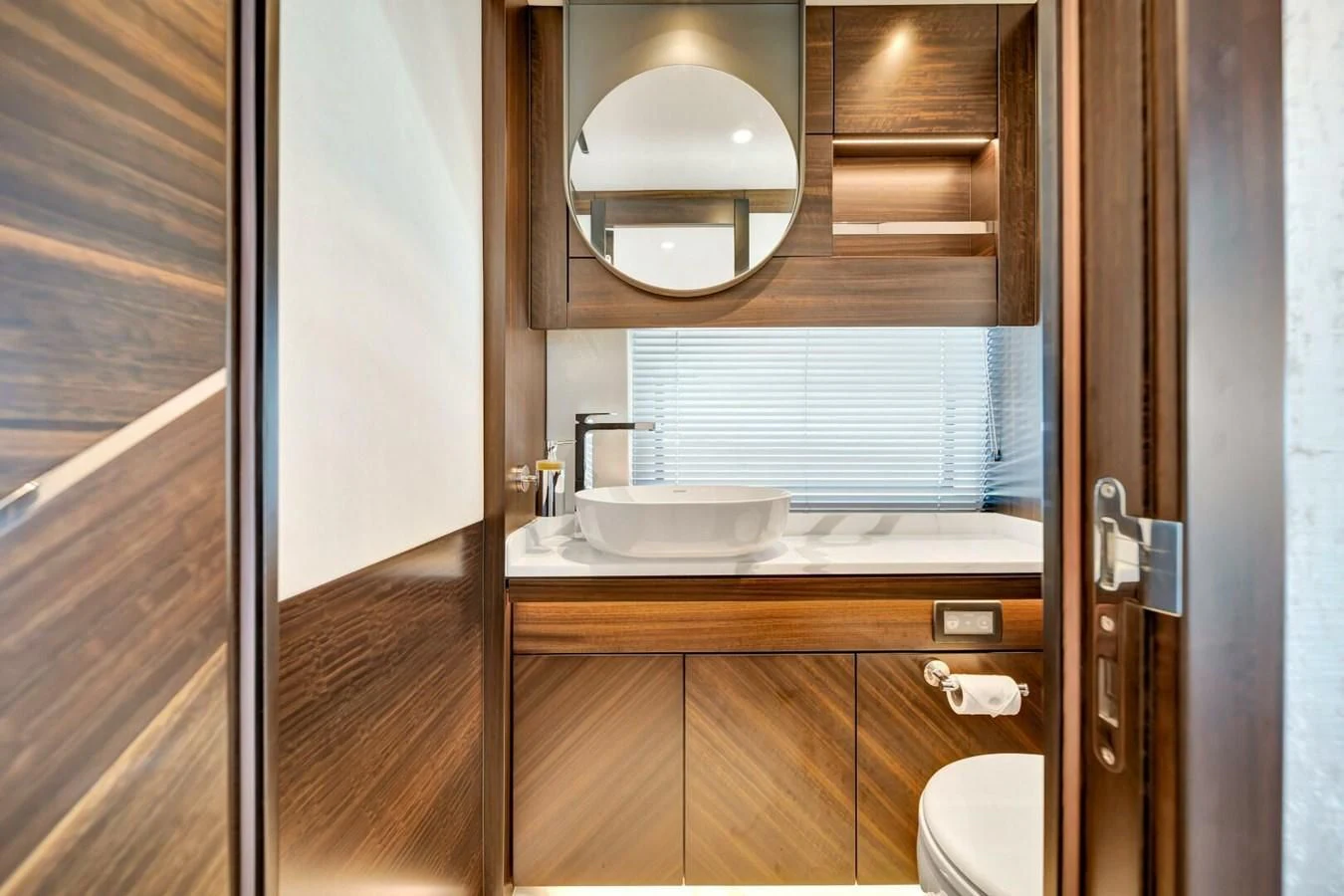a bathroom with a sink and a mirror aboard 76 YACHT Yacht for Sale