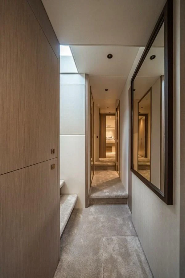 a hallway with a door and a carpet aboard 76 YACHT Yacht for Sale