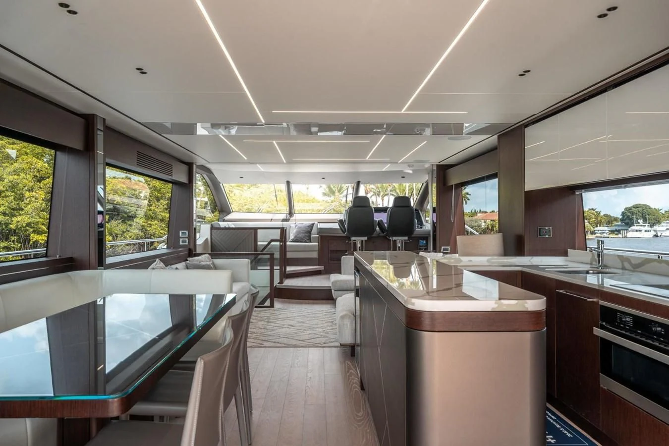 a large room with a table and chairs aboard 76 YACHT Yacht for Sale