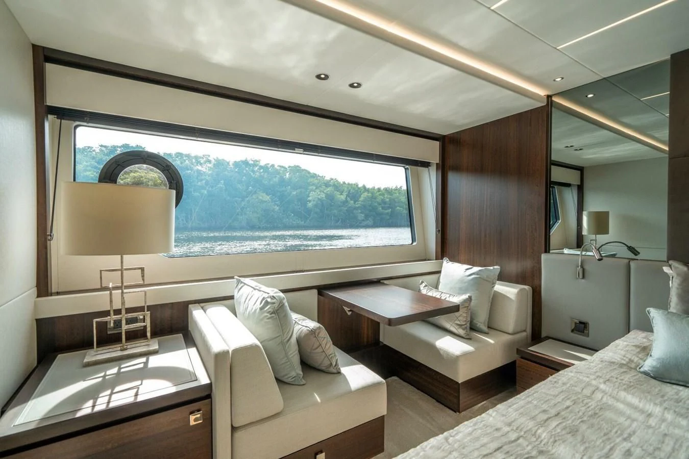 a room with a bed and a large window aboard 76 YACHT Yacht for Sale